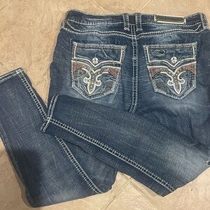 Rock Revival Blue Boot Cut Jeans with Embellished Pockets